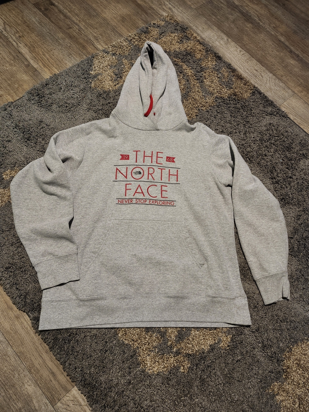 The North Face Men's Heather Gray Hoodie with Red Logo
